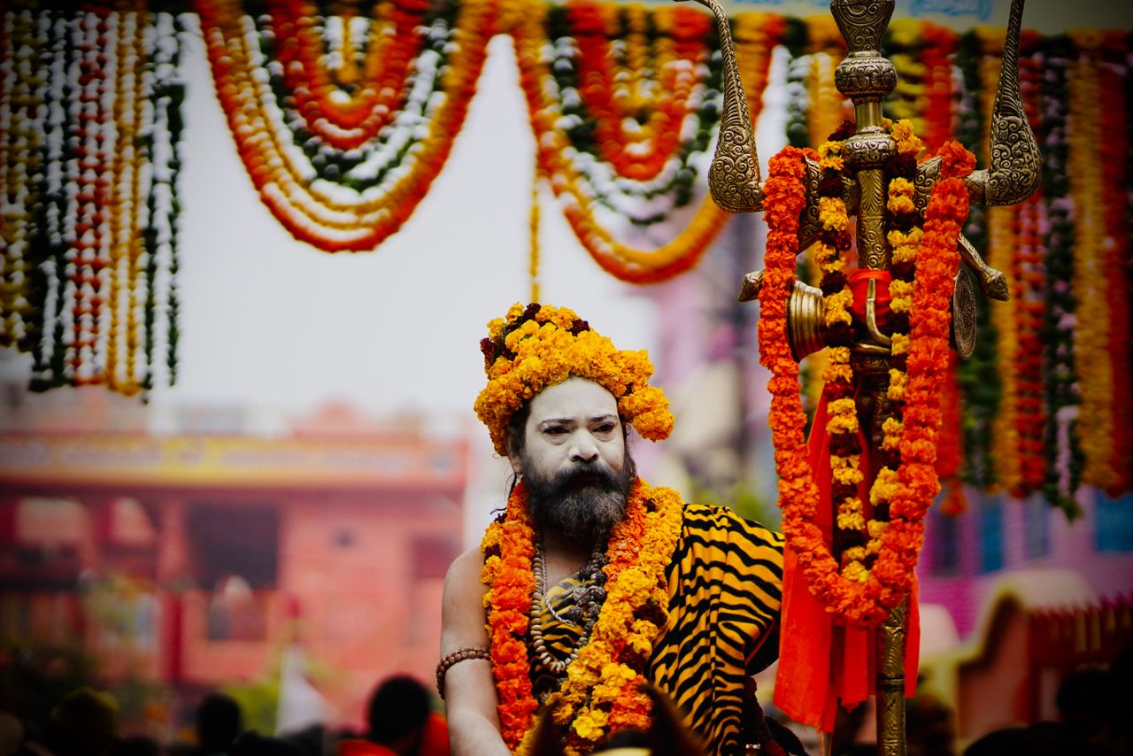 A colorful portrayal of an ascetic at a traditional festival in Prayagraj, India.